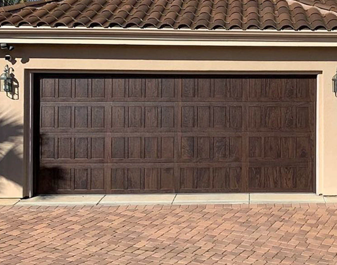CHI Timeless Stamped Shaker Insulated Modern Garage Doors in Walnut